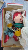 Howdy Doody hand puppet with visible wear in original box with tissue paper.