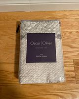 Front packaging of the Oscar Oliver King Pillow Sham showing the product name and brand on a purple label.