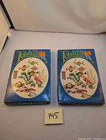 Two vintage boxed lobster tool sets made in Japan and sold at Eaton's, showing original packaging.