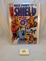 Front cover photo showing complete comic book cover with title, characters, and price details.