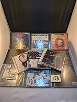 Photo of Hip Hop and Rap CDs including Public Enemy, LL Cool J, and Lauryn Hill albums