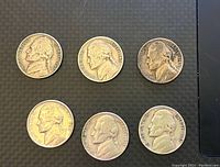 Obverse view of 6 early Jefferson nickels showing dates 1939, 1940, 1941, 1943, 1944, 1945
