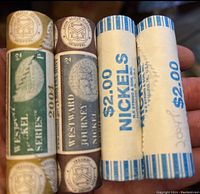 Four unopened rolls of Jefferson Westward Journey nickels with clear labels indicating mint location and year.