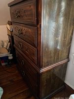 Side view showing wood/veneer construction and veneer grain pattern on the side with laminate top visible.