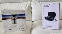 Original box of the VSN V.360 360 degree camera and boxed carry case.