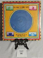 Front cover of Talking Heads 'Speaking in Tongues' vinyl LP showing colorful geometric artwork on yellow background.