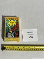 Full box of the 1987 Albano-Waite tarot deck showing the front cover with the image of The Sun card and box title.