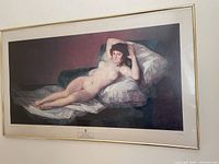 Photo of the full framed print featuring The Nude Maja by Goya in a gold-tone frame.