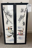 Two framed Japanese art panels displayed side by side, showing full pieces and entire lot.