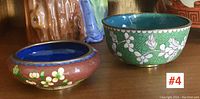 View of both cloisonné bowls showing exterior floral patterns and interiors.