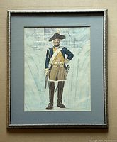 Framed print of Brunswick Dragoon Regiment Von Ludwig by Tom McNeely with light blue matting and decorative silver frame showing slight damage.