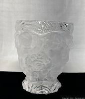 Front and side view showing frosted floral patterns and wavy rim