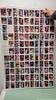 Full view of the uncut sheet showing multiple basketball cards laid out in a grid