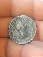 Obverse side of the 1806 English copper coin showing the portrait of King George III with surrounding inscription.