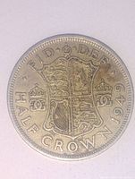 Reverse side of 1949 English Half Crown coin featuring English royal shield and inscriptions.