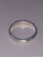 Close-up photo showing the inside of the ring band with the .925 marking visible.