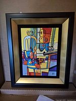 Full view of framed artwork