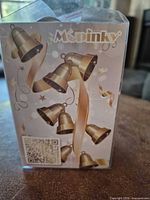 front of MCPINKY branded box