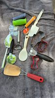 Assorted kitchen utensils laid out