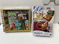 Both toy sets shown side by side on white surface under neutral lighting.