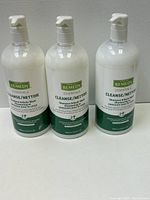 Front view of three Remedy Essentials Shampoo & Body Wash bottles showing label and pump tops.