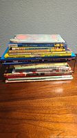 Stack of 14 used kids books showing titles and spines