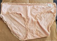 Front view of chai colored boyshort women's underwear with lace trim and Jenni brand tag.