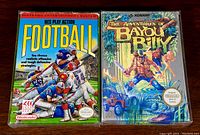 Front covers of the two game boxes: NES Play Action Football and The Adventures of Bayou Billy, showing colorful game art and original Nintendo seals.