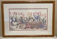 Framed watercolor print showing full view of artwork with bunnies, baskets, and tulips in pastel colors.