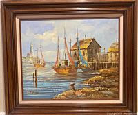 Frontal view of the oil painting showing the harbor scene with boats and buildings, signed P. Stevens lower left.