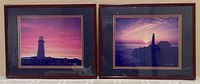 Pair of two framed lighthouse photographs by Erskine Wood, showing vibrant sunrise scenes with lighthouses silhouetted against colorful skies.