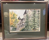 Front view of the framed watercolour painting showing architectural details and trees on Queen’s University campus.