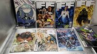 All eight bagged Fantastic Four comics laid out