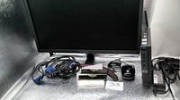Front view of AOpen monitor, Dell micro PC, Mouse, RAM sticks, cables