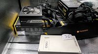 Corsair TX550M PSU, Thermaltake 750W PSU box, DSC GS306 communicator on shelf