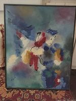 Full view of the vintage abstract French painting showing the colorful composition and framing.