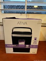 Front of boxed Ativa 6-sheet cross-cut shredder showing product image, brand, and capacity details.