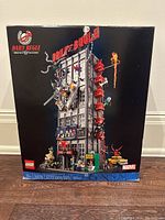 Front of box showing full artwork of Daily Bugle building set