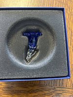 Swarovski blue Genitan flower crystal figurine in original foam insert box.