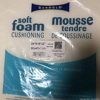 Close-up image of Sun Glo packaging label on soft foam cushioning upholstery foam showing dimensions 24x16x2 inches (60x40x5 cm).