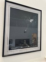 Framed black and white photograph of Halley's Comet with signatures of the photographers.