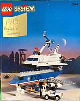 Front cover of 1995 LEGO System manual showing space shuttle and figures, with a blue sky and desert background, marked '1995 Printed in Germany'.