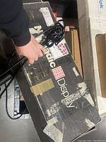 Box of 5 Nomadic Display spotlights showing original branded packaging and power cords.