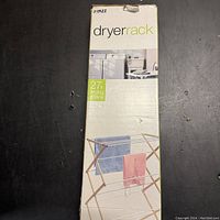 Box showing the DAZZ dryer rack with illustration and drying space measurement on front