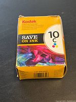 Photo of front of Kodak 10C color ink cartridge box with branding and colorful graphic