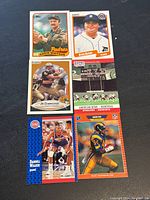 Six mixed sports cards from 1990-20s, including baseball, football, basketball with Topps, Fleer, Pro Set brands