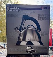 Front and side view of the Pykal box highlighting the whistling kettle features and design.