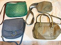 Group shot of all four bags showing colors, styles and straps