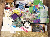 Overview of all craft supplies spread out on floor