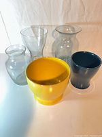 Group shot of all five vases and planters